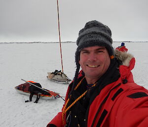 Expeditioner taking a self photo on the sea ice