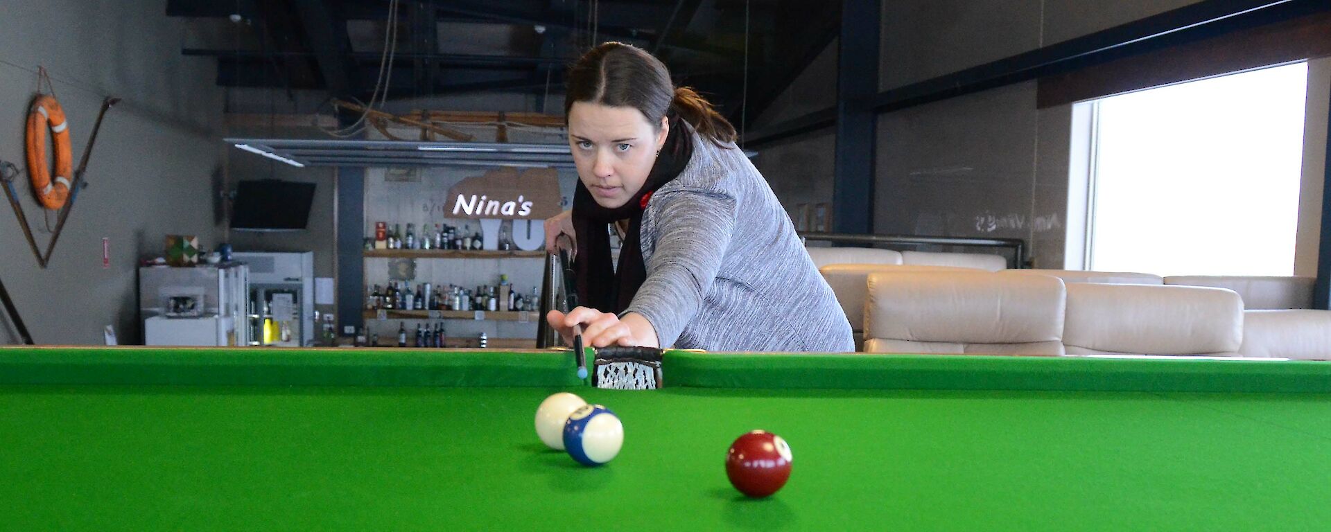 Expeditioner playing snooker