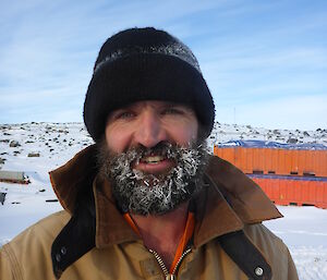 Close up photo of expeditioner with a frozen beard