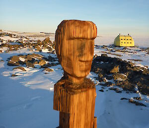 Carved wooden post statue