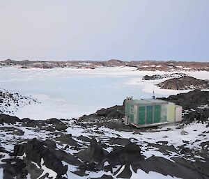 Small hut on the edge of the sea ice