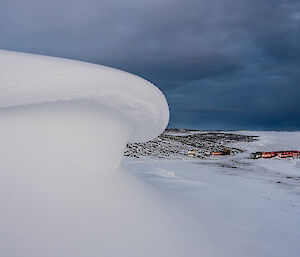 Snow wave with the wharf in the background