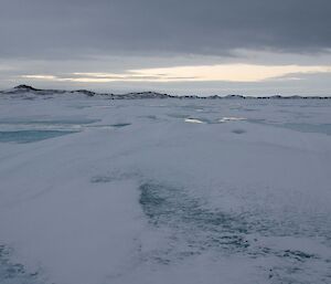 Sea ice with lumpy snow making riding difficult