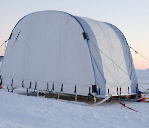 Small compressor and generator alongside mobile tent