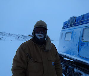 Close up photo of expeditioner with a frozen beard