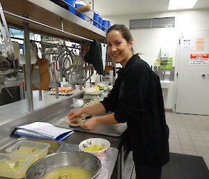Expeditioner making tarts in the kitchen