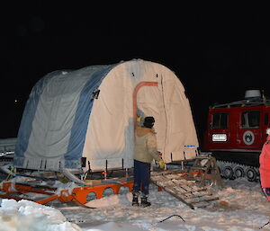 White mobile tent on the sea ice used as a change room