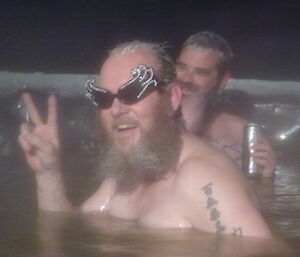Expeditioner wearing costume glasses in the spa