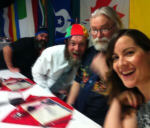 Expeditioners sitting at formal dinner table