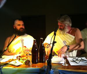 Two men dressed in togas