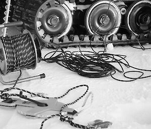 rope, tape measure, drill and probe on the sea ice