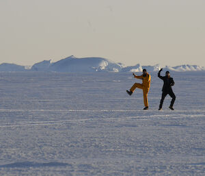 Two expeditioners ganga style dancing on the sea ice