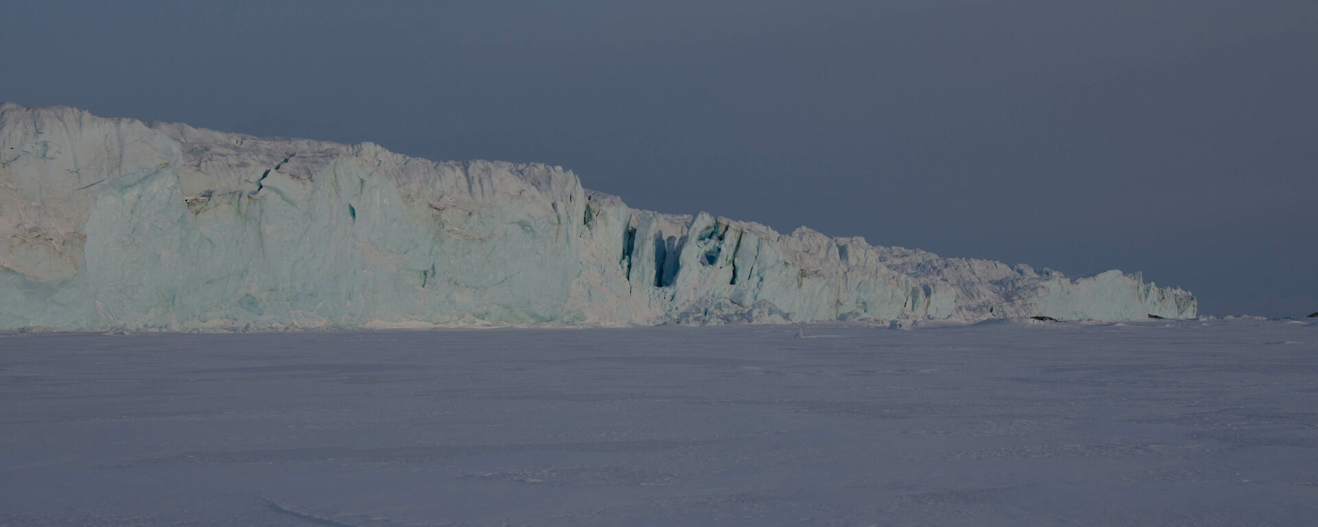 A large glacier photo taken from a distance