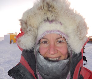 Close up photo of expeditioners face, wearing yellow antarctic jacket