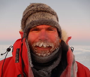 Close up photo of expeditioner with a frozen beard