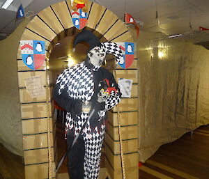 Expedtitioner wearing a black and white jester outfit