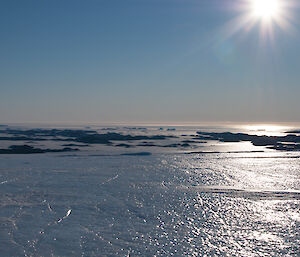 View of the sea ice and islands taken from the plateau, looking down