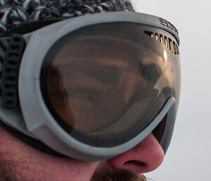 Close up photo of expeditioner wearing goggles