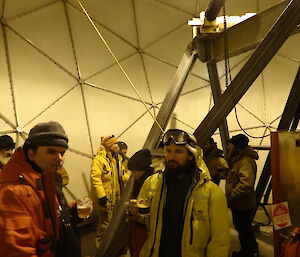 Group of people enjoying a few drinks in a large dome