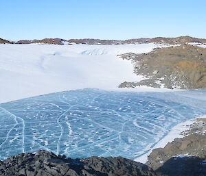 High on a hill looking down over Breid Basin — a frozen fjord and plateau