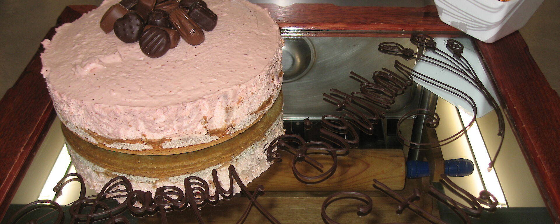 Cheesecake with happy birthday sign