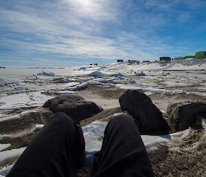 Photo taken on the rocky icy beach with the station in the background