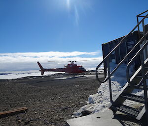 Helicopter lands on the heli pad