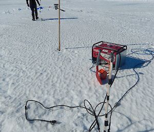 Generator on the sea ice along with various cables