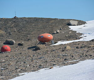 Photo of huts on land