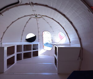 Interior photo of the new hut with white furnishings