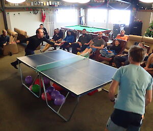 Two expeditioners playing table tennis