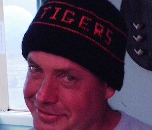 Wayne’s beanie has the word ‘Tigers’ on it — his football team