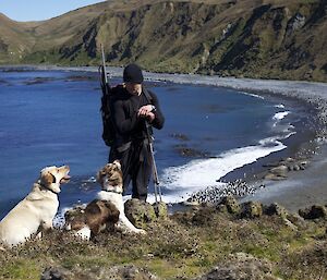 Jack and his dogs Rico and Gus enjoy the sun at Sandy Bay