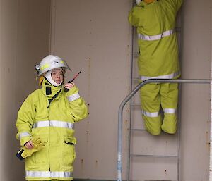 Ashleigh and Col searching a building