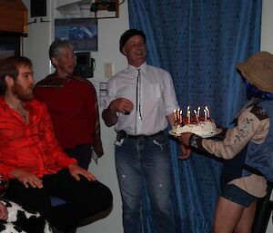 Peter P is presented with his Birthday cake
