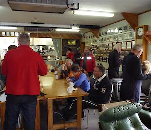 Visitors enjoy a cup of tea and a chat with expeditioners