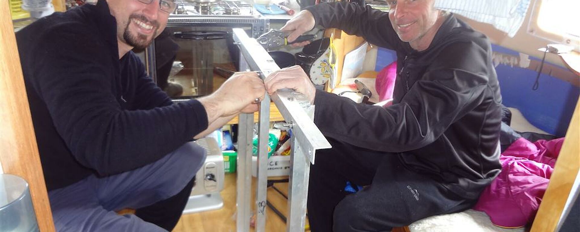 Dan and Tony assembling the frames in Windy Ridge hut