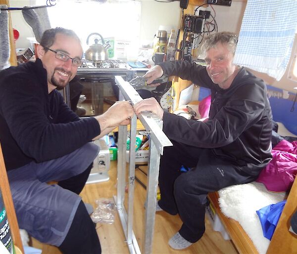 Dan and Tony assembling the frames in Windy Ridge hut