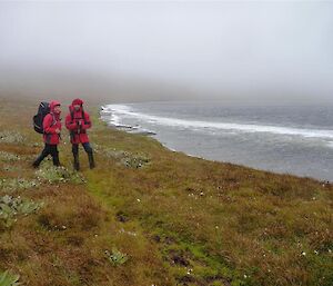 Lisa and Robbie beside Square Lake — with wind foam along the edge.