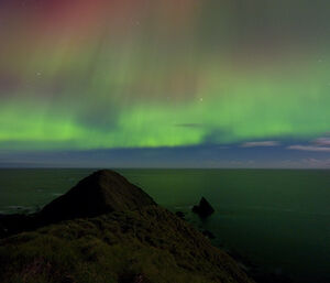 North from North Head — more green and red auroras in the sky
