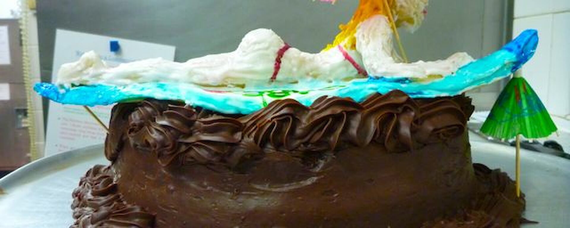 A surfing beauty — cake with surfer on top made by Belinda