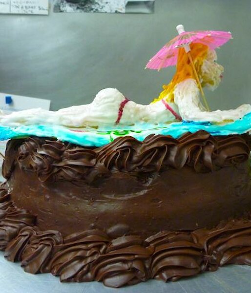 A surfing beauty — cake with surfer on top made by Belinda