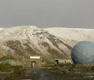 Snow falls the day after the Aurora Australis leaves Macquarie Island