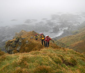 Mango, Andrew and Narelle climbing up one of the ‘jump ups'