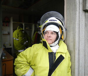 Maria dressed in fire fighting uniform