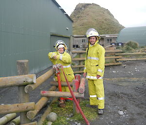 Expeditioners putting out a fire