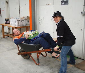Maria (Macquarie Island chef) with her shopping trolley full of goodies including an expeditioner