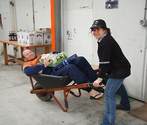 Maria (Macquarie Island chef) with her shopping trolley full of goodies including an expeditioner