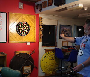 Jum testing the new darts board wall