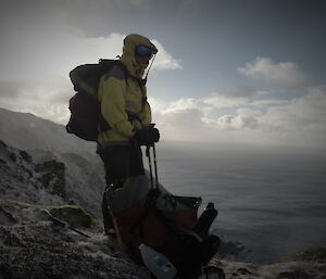 Kelly hunting the east coast in full gear overlooking water